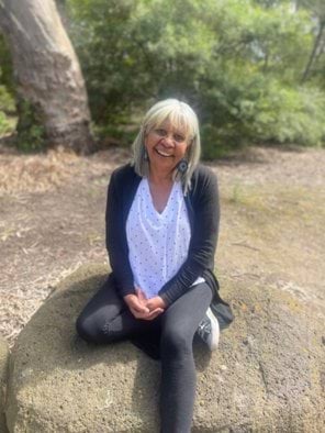 Picture taken of Eva Jo Edwards sitting outside. 